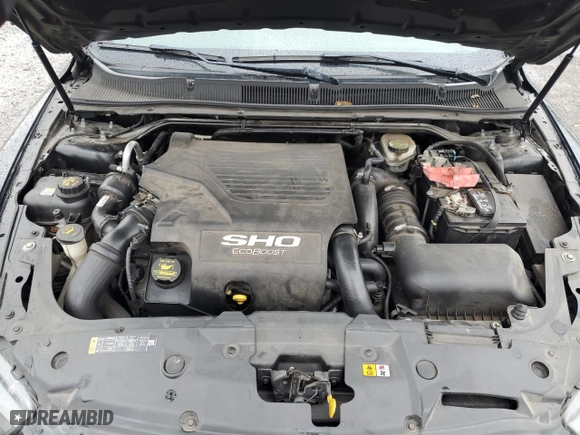 2014 Ford Taurus SHO with VIN 1FAHP2KT6EG144688, listed as a Copart auction lot 52629225 with 122,118 mi miles and Clean Title. Bid and sale history available at carsss.com. Image 11.
