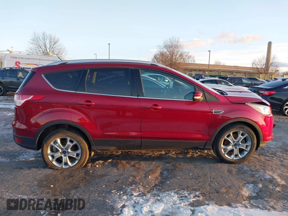 2015 Ford Escape Titanium with VIN 1FMCU9J99FUB34831, listed as a IAAI auction lot 41278305 with 59,658 mi miles and . Bid and sale history available at DreamBid. Image 13.
