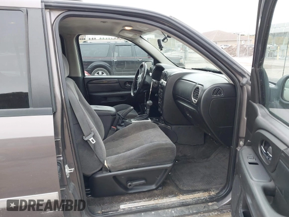 2008 GMC Envoy SLE2 with VIN 1GKDT13S482236375, listed as a IAAI auction lot 41510610 with 183,716 mi miles. Bid and sale history available at carsss.com. Image 5.