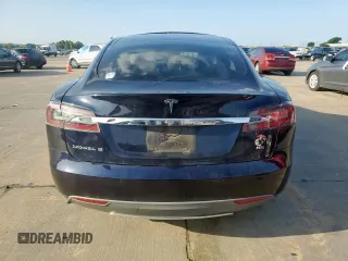2014 Tesla Model S 60 с VIN 5YJSA1H16EFP50018, выставлен на аукционе Copart как лот 64372605 с пробегом 165 910 миль миль и Списание • Salvage title. История ставок и продаж доступна на DreamBid. Изображение 6.