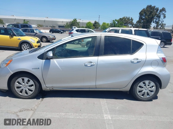 2014 Toyota Prius One with VIN JTDKDTB38E1061202, listed as a IAAI auction lot 42044747 with 133,409 mi miles and . Bid and sale history available at DreamBid. Image 14.