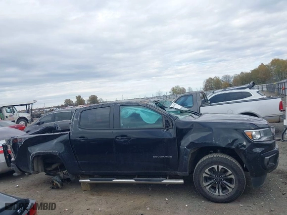 2022 Chevrolet Colorado 4WD Z71 with VIN 1GCGTDENXN1136509, listed as a IAAI auction lot 40990490 with 82,686 mi miles. Bid and sale history available at carsss.com. Image 17.