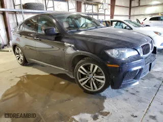 2012 BMW X6 M with VIN 5YMGZ0C57CLK14540, listed as a Copart auction lot 47419655 with 128,210 mi miles and Salvage Title. Bid and sale history available at carsss.com. Image 4.