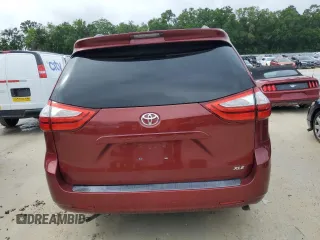 2015 Toyota Sienna XLE with VIN 5TDYK3DC4FS643881, listed as a Copart auction lot 56684635 with 137,781 mi miles and Salvage Title. Bid and sale history available at DreamBid. Image 6.