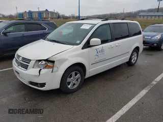 2010 Dodge Grand Caravan SXT with VIN 2D4RN5D1XAR191011, listed as a IAAI auction lot 41162015 with 83,251 mi miles and . Bid and sale history available at DreamBid. Image 2.