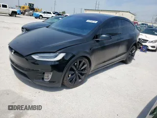 2017 Tesla Model X 90D z VIN 5YJXCBE29HF054311, wystawiony jako Copart lot #53548315 z przebiegiem 93 078 mil mil oraz Szkoda całkowita • Salvage title. Historia ofert i sprzedaży dostępna na DreamBid. Obrazek 1.