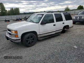 1999 Chevrolet Tahoe Z71 with VIN 1GNEK13R1XJ365475, listed as a Copart auction lot 56258175 with 184,647 mi miles and Clean Title. Bid and sale history available at DreamBid. Image 1.