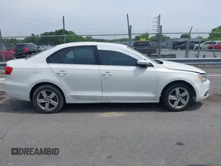 2014 Volkswagen Jetta TDI w/Premium/Nav with VIN 3VWLL7AJ4EM430524, listed as a IAAI auction lot 42268673 with 137,721 mi miles and . Bid and sale history available at DreamBid. Image 12.