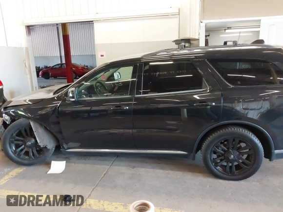 2016 Dodge Durango Limited with VIN 1C4RDJDG5GC433329, listed as a IAAI auction lot 42179512 with 153,648 mi miles and . Bid and sale history available at DreamBid. Image 14.