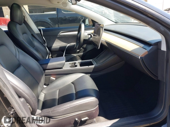 2021 Tesla Model 3 Long Range with VIN 5YJ3E1EB4MF064631, listed as a IAAI auction lot 41424856 with 95,511 mi miles and . Bid and sale history available at DreamBid. Image 5.