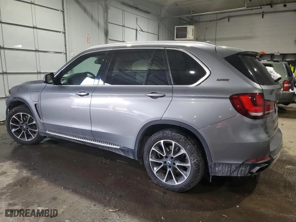 2018 BMW X5 xDrive40e iPerformance with VIN 5UXKT0C53J0W00793, listed as a Copart auction lot 42131925 with 87,928 mi miles and Salvage Title. Bid and sale history available at carsss.com. Image 2.
