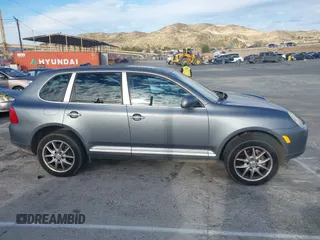 2004 Porsche Cayenne S with VIN WP1AB29P24LA72573, listed as a IAAI auction lot 41610225 with 143,280 mi miles. Bid and sale history available at carsss.com. Image 13.