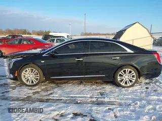 2018 Cadillac XTS Luxury with VIN 2G61M5S30J9132540, listed as a IAAI auction lot 41348925 with 90,921 mi miles and . Bid and sale history available at DreamBid. Image 14.