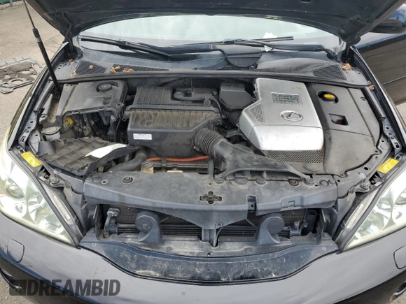 2007 Lexus RX 400h z VIN JTJGW31U372002076, wystawiony jako Copart lot #54977055 z przebiegiem 160 000 mil mil oraz Tytuł czysty. Historia ofert i sprzedaży dostępna na DreamBid. Obrazek 11.