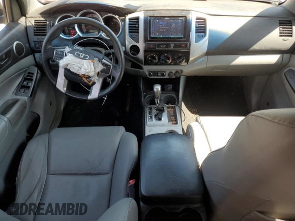 2013 Toyota Tacoma with VIN 5TFLU4EN7DX077796, listed as a Copart auction lot 51986905 with 163,225 mi miles and Salvage Title. Bid and sale history available at DreamBid. Image 8.
