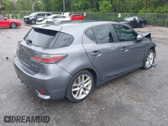 2015 Lexus CT 200h z VIN JTHKD5BH5F2214474, wystawiony jako IAAI lot #42417192 z przebiegiem 104 802 mil mil oraz . Historia ofert i sprzedaży dostępna na DreamBid. Obrazek 4.