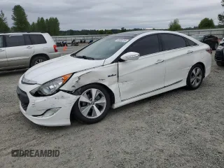 2012 Hyundai Sonata Hybrid z VIN KMHEC4A49CA024975, wystawiony jako Copart lot #55899755 z przebiegiem 92 745 mil mil oraz Szkoda całkowita • Salvage title. Historia ofert i sprzedaży dostępna na DreamBid. Obrazek 1.