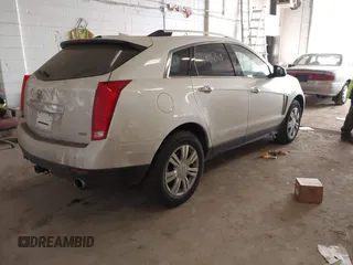 2014 Cadillac SRX Luxury Collection z VIN 3GYFNEE35ES681424, wystawiony jako IAAI lot #41854969 z przebiegiem 135 163 mil mil oraz . Historia ofert i sprzedaży dostępna na DreamBid. Obrazek 4.