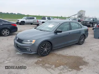 2016 Volkswagen Jetta Sport z VIN 3VWD17AJ8GM292211, wystawiony jako IAAI lot #42371317 z przebiegiem 142 360 mil mil oraz . Historia ofert i sprzedaży dostępna na DreamBid. Obrazek 2.