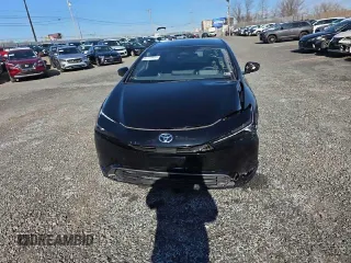 2023 Toyota Prius LE z VIN JTDADABU7P3002593, wystawiony jako Copart lot #48176675 z przebiegiem 10 726 mil mil oraz Szkoda całkowita • Salvage title. Historia ofert i sprzedaży dostępna na DreamBid. Obrazek 5.