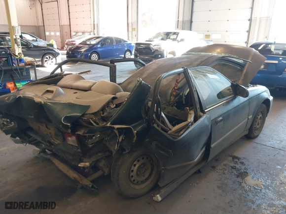 1996 Honda Civic DX with VIN 1HGEJ6625TL019386, listed as a IAAI auction lot 40775179 with 212,267 mi miles. Bid and sale history available at carsss.com. Image 6.