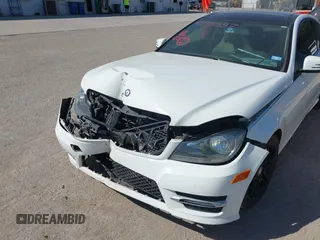 2015 Mercedes-Benz C-Class C 250 with VIN WDDGJ4HB1FG403788, listed as a IAAI auction lot 40495537 with 129,832 mi miles. Bid and sale history available at carsss.com. Image 6.