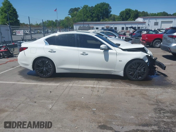 2019 Infiniti Q50 Luxe z VIN JN1EV7AP7KM513482, wystawiony jako IAAI lot #42000334 z przebiegiem 101 789 mil mil oraz . Historia ofert i sprzedaży dostępna na DreamBid. Obrazek 13.