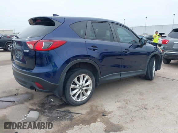2013 Mazda CX-5 Grand Touring with VIN JM3KE2DE3D0168529, listed as a IAAI auction lot 41884766 with 173,558 mi miles. Bid and sale history available at carsss.com. Image 4.