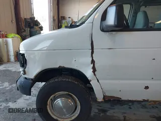 2003 Ford Econoline Cargo z VIN 1FTNE24W53HA22180, wystawiony jako IAAI lot #42206484 z przebiegiem 306 921 mil mil oraz . Historia ofert i sprzedaży dostępna na DreamBid. Obrazek 13.