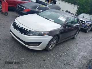 2014 Kia Optima LX with VIN 5XXGM4A70EG260667, listed as a IAAI auction lot 42531882 with 147,829 mi miles and . Bid and sale history available at DreamBid. Image 2.