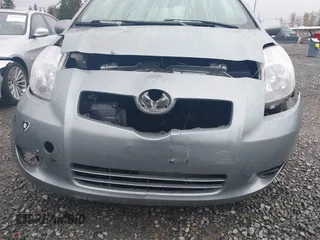 2007 Toyota Yaris with VIN JTDJT923175119695, listed as a IAAI auction lot 41933229 with 133,146 mi miles. Bid and sale history available at carsss.com. Image 6.