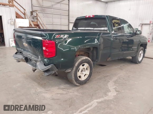 2015 Chevrolet Silverado 1500 LT with VIN 1GCVKREC2FZ147321, listed as a IAAI auction lot 41995003 with 148,053 mi miles and . Bid and sale history available at DreamBid. Image 4.