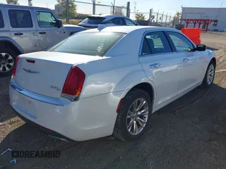 2016 Chrysler 300 with VIN 2C3CCAEG8GH198031, listed as a IAAI auction lot 40481170 with 118,874 mi miles. Bid and sale history available at carsss.com. Image 4.