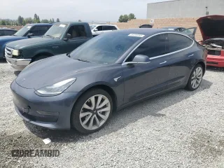 2018 Tesla Model 3 Long Range Battery z VIN 5YJ3E1EA1JF010853, wystawiony jako Copart lot #58238065 z przebiegiem 93 701 mil mil oraz Szkoda całkowita • Salvage title. Historia ofert i sprzedaży dostępna na DreamBid. Obrazek 1.