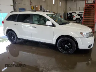 2012 Dodge Journey Crew z VIN 3C4PDCDG6CT184654, wystawiony jako Copart lot #64271625 z przebiegiem 187 734 mil mil oraz Szkoda całkowita • Salvage title. Historia ofert i sprzedaży dostępna na DreamBid. Obrazek 4.