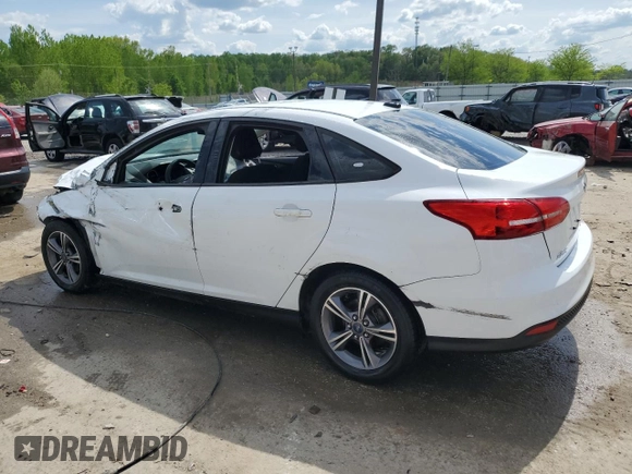 2018 Ford Focus SE with VIN 1FADP3FE0JL286102, listed as a Copart auction lot 54220415 with 142,956 mi miles and Non repairable. Bid and sale history available at DreamBid. Image 2.