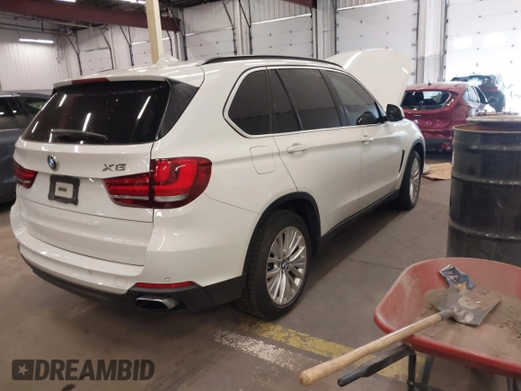 2015 BMW X5 xDrive50i z VIN 5UXKR6C50F0J76255, wystawiony jako IAAI lot #42104019 z przebiegiem 74 400 mil mil oraz . Historia ofert i sprzedaży dostępna na DreamBid. Obrazek 4.
