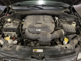 2014 Jeep Grand Cherokee Overland with VIN 1C4RJFCG6EC279248, listed as a Copart auction lot 49300895 with 165,248 mi miles and Salvage Title. Bid and sale history available at carsss.com. Image 12.