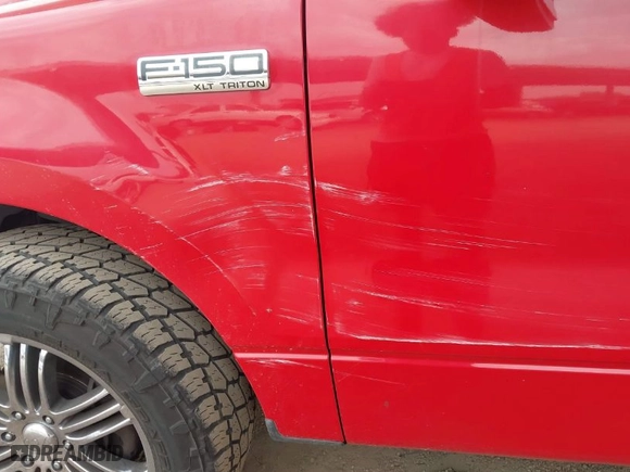 2004 Ford F-150 XLT with VIN 1FTRW12W74FA15854, listed as a IAAI auction lot 41917424 with 325,330 mi miles. Bid and sale history available at carsss.com. Image 6.