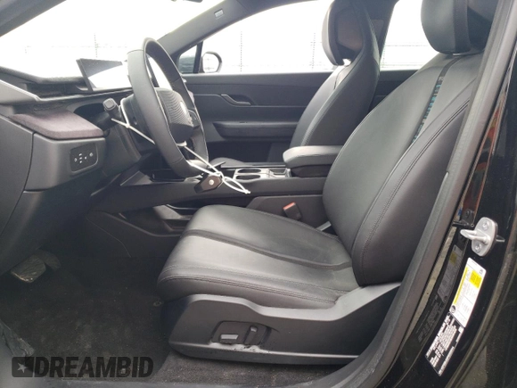2023 Fisker Ocean One z VIN VCF1ZBU22PG002044, wystawiony jako Copart lot #84522334 z przebiegiem Nie podano mil oraz Szkody całkowita. Historia ofert i sprzedaży dostępna na DreamBid. Obrazek 7.