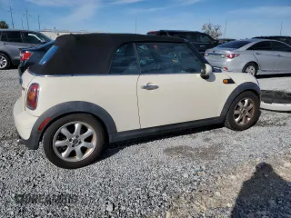 2010 MINI Convertible with VIN WMWMR3C55ATU97172, listed as a Copart auction lot 42726215 with 99,164 mi miles and Salvage Title. Bid and sale history available at DreamBid. Image 3.