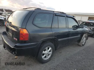 2006 GMC Envoy SLT with VIN 1GKDS13S662220064, listed as a Copart auction lot 84381274 with 237,220 mi miles and Salvage Title. Bid and sale history available at carsss.com. Image 3.