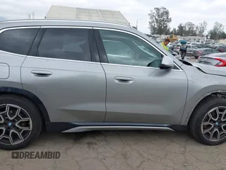 2023 BMW X1 xDrive28i with VIN WBX73EF02P5Y08733, listed as a IAAI auction lot 41901171 with 13,684 mi miles and . Bid and sale history available at DreamBid. Image 14.