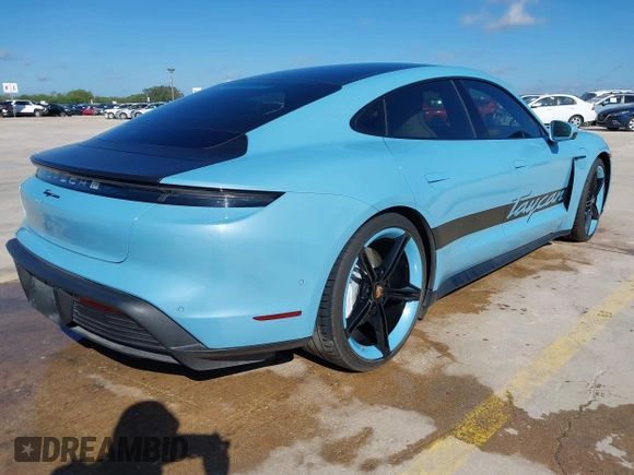 2022 Porsche Taycan with VIN WP0AA2Y10NSA10908, listed as a IAAI auction lot 42257582 with 23,806 mi miles and . Bid and sale history available at DreamBid. Image 4.
