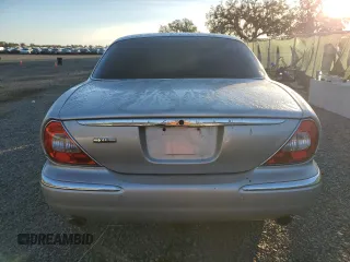 2004 Jaguar XJ with VIN SAJWA71C84SG32106, listed as a Copart auction lot 81837704 with 119,268 mi miles and Salvage Title. Bid and sale history available at carsss.com. Image 6.