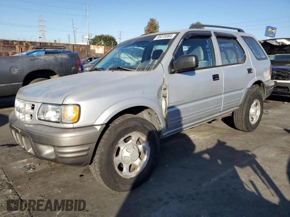 2000 Isuzu Rodeo S z VIN 4S2CK58W2Y4311726, wystawiony jako Copart lot #85070364 z przebiegiem 226 510 mil mil oraz Szkody całkowita. Historia ofert i sprzedaży dostępna na DreamBid. Obrazek 1.