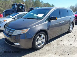 2012 Honda Odyssey Touring with VIN 5FNRL5H91CB057344, listed as a IAAI auction lot 41835272 with 158,854 mi miles. Bid and sale history available at carsss.com. Image 18.