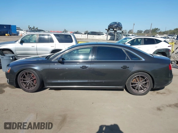 2011 Audi A8 with VIN WAURVAFD9BN014362, listed as a IAAI auction lot 41960366 with 135,244 mi miles and . Bid and sale history available at DreamBid. Image 14.