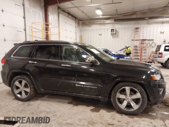 2015 Jeep Grand Cherokee Overland with VIN 1C4RJFCT7FC612930, listed as a IAAI auction lot 41485240 with 189,564 mi miles. Bid and sale history available at carsss.com. Image 13.