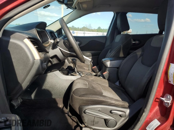 2016 Jeep Cherokee Sport with VIN 1C4PJLABXGW258322, listed as a Copart auction lot 51008975 with 128,865 mi miles and Salvage title. Bid and sale history available at DreamBid. Image 7.